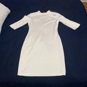 Alice &Olivia NWT never been worn. Has some stretch to it. Love it but to small